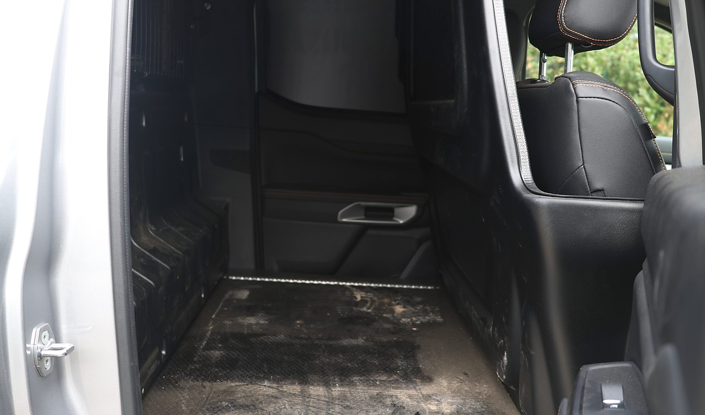 Ford Ranger 2-Seat rear cabin as delivered, showing the panelled window and bulkhead