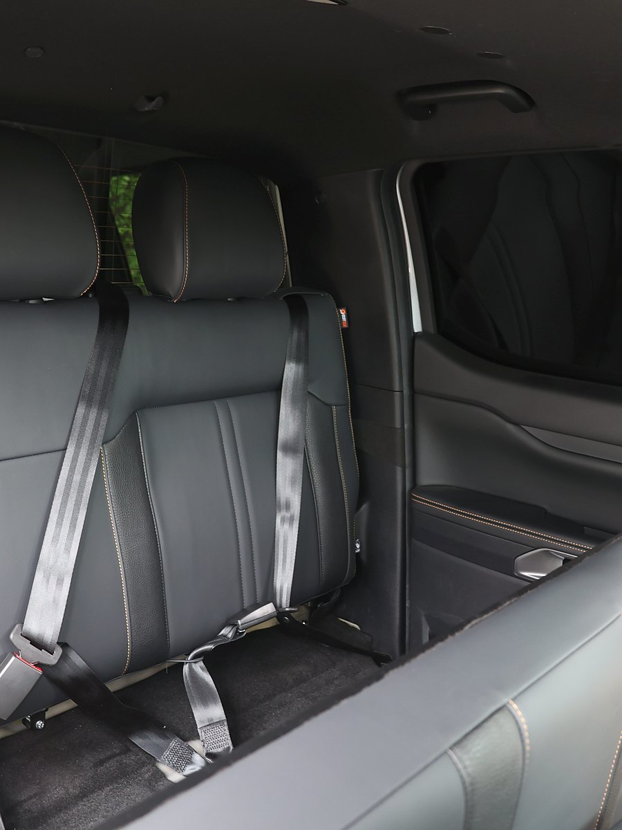 Ford Ranger rear bench with the seat base folded up to form a half height bulkhead