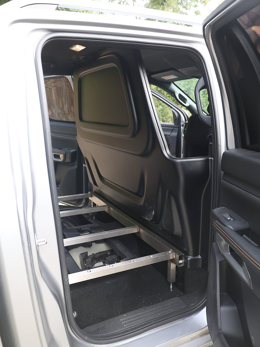 Seat mounting frame fixed to the Ford Ranger floor before the bench goes in