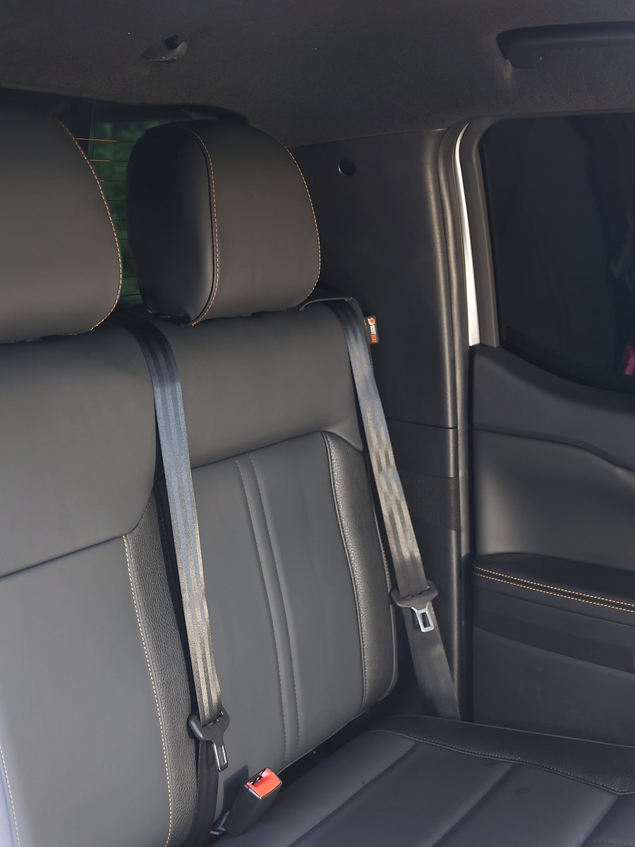 Three point seat belt fitted to the factory mounting point in a Ford Ranger