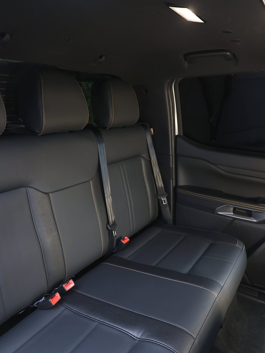 Ford Ranger rear bench seat with three belt buckles, seating three across